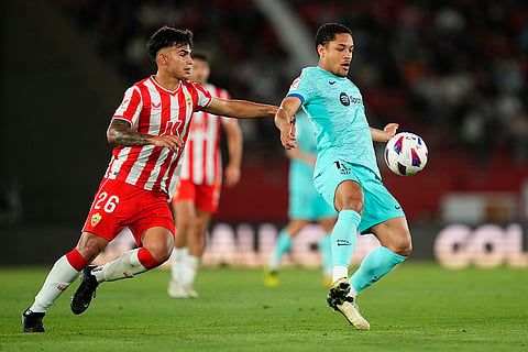 Vitor Roque challenged by Marcos Pena